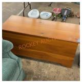 Wooden blanket chest includes contents