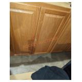 30" W x 12" D x 36" H wall cabinet oak colored