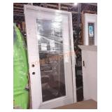 36" x 80" white exterior door in frame with window