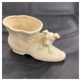 Vintage McCoy pottery dog on a shoe planter