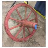 Antique wooden wheel approx 2 ft round with metal
