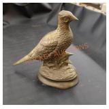 Brass pheasant figure with hollow center