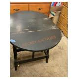 Oval drop leaf side table