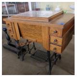 35in x 19in antique sewing machine cabinet, no
