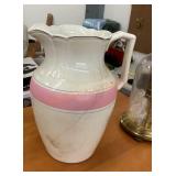 Antique semi granite pitcher