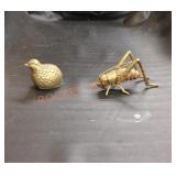 Vintage brass cricket and quail