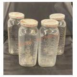 Vintage glass juice/water bottles with lids