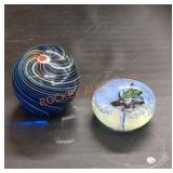 Spherical glass paperweights