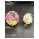 Spherical glass paperweights