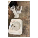 Antique enameled pedestal sink with marble