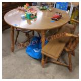 42" round dining table with 2 leaves and chairs
