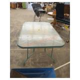 Approximately 5 ft x 3 ft glass top patio table