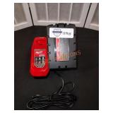 Milwaukee 18V 6.0Ah. Battery and charger. Located