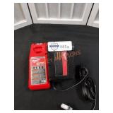 Milwaukee 18v 2.0Ah. Battery and charger. Located