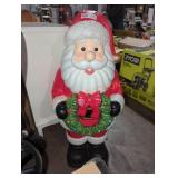 2.5 ft LED stand up Santa holding wreath