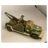 Diecast replica of a 1957 international army tow