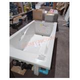 72" W x 36" D white bathtub with jets