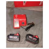 Milwaukee Red lithium XC5.0 battery and charger