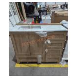Light brown Vanity w marble countertop with sink