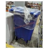 Blue toter garbage can