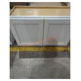 White cabinet approximately 29-5/8" W