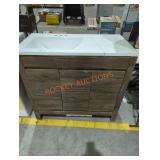 Dark wood single sink bathroom vanity damaged