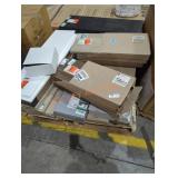 Skid full of shelving different colors and sizes