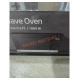 LG microwave oven 0.9 cu.ft. black dented