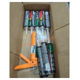 8 bottles of construction adhesive with gun