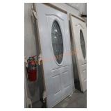 White Exterior Door With Oval Window