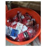 Bucket full of screws and bolts