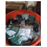 Bucket full of screws and bolts