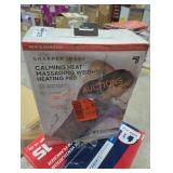 Calming heat massaging weighted heat pad