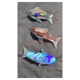 Glass dolphin paperweights
