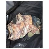 Bag of Hunting Gear and Propane Portable Heater