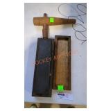 Antique sharpening stone and barrel tap