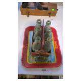 Vintage coca cola bottles and tray