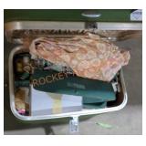 Vintage travel case full of sewing notions