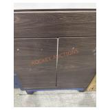 Brown vanity 24 1/4" L x 19 1/2" D x 35"H