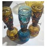 3 small oil lamps