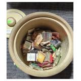 Decorative pottery crock filled with vintage match