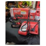 2 Milwaukee M18 5 ah batteries and charger