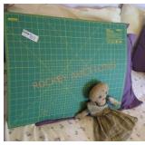 cutting mat and rag doll