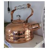 Copper colored teapot