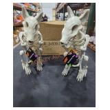 (2) Skeleton Dogs