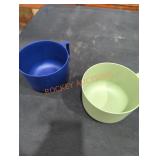 Green and blue plastic mugs