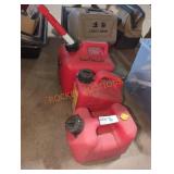 Three Small Gasoline Cans