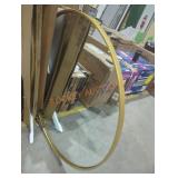 Round mirror with gold trim
