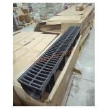 Box of plastic drains with lids