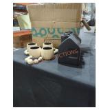 3 houses and candle holders